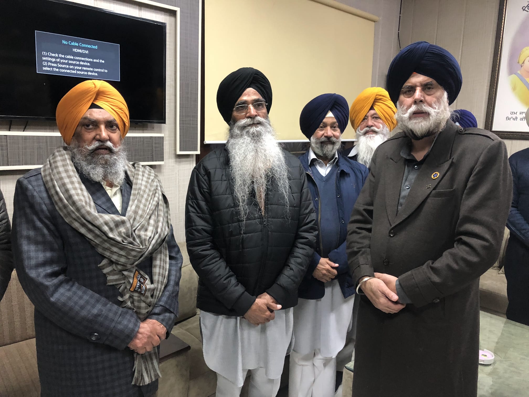 Ghani Dayapal Singh with SGPC representatives during the portrait process